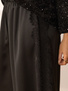 Czarne satynowe spodnie z wiskozy z lampasem z koronki