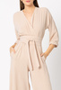 Beżowy kombinezon z paskiem Emmy