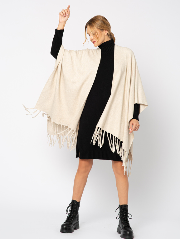 Beżowy sweter ponczo z frędzlami