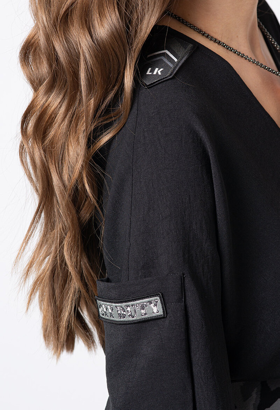 Czarny kombinezon z naszywkami i paskiem z drukowanej gumy Axelle