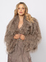 Krótka beżowa kurtka z długim włosiem