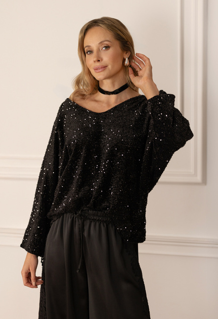 Czarna cekinowa bluzka z kokardą z tyłu