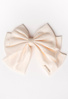 Krótka kokarda do włosów w kolorze ecru