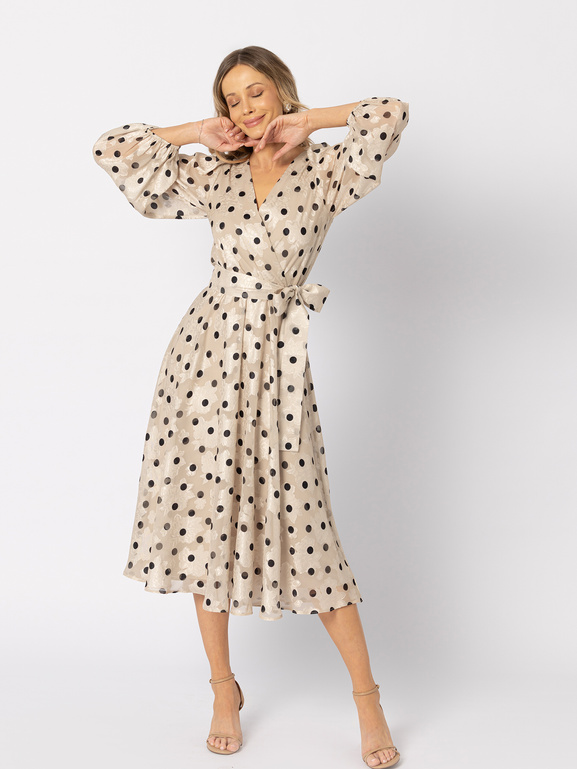 Beżowa sukienka w czarne grochy z wiązaniem